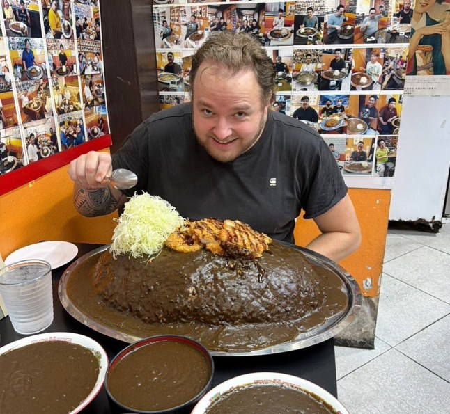 A German Michelin-trained chef allegedly cheated at a restaurant's curry-eating challenge to win a cash prize. Sebastian Schwesinger, 37, (PICTURED ON HIS THIRD FOOD CHALLENGE ATTEMPTING TO WIN 30,000 BAHT BEFORE HE WAS CAUGHT CHEATING) took on a whopping 10 kilogrammes (22 lbs) plate of curry and rice at a restaurant in Bangkok, Thailand. But he was caught appearing to cheat when staff saw him scooping up mounds of sauce-covered rice into his backpack on December 17. Footage shows Sebastian, from Leipzig, checking to see if he was being watched before stealthily disposing of the food in the bag next to him. Staff later confronted him and demanded that he pay for the meal. They investigated and claimed he had cheated at two other locations and collected the prize money before being caught. PACKAGE: Video, pictures, text