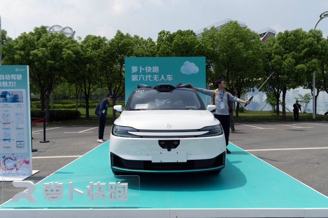 A Baidu Inc. Apollo Go RT6 robotaxi on display during the Baidu Create AI Developer Conference in Wuhan, China, on Friday, April 25, 2025.