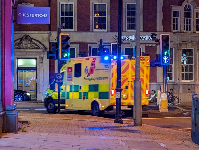 Mandatory Credit: Photo by Michael Nguyen/NurPhoto/Shutterstock (16200177a) A London Ambulance Service (LAS) emergency ambulance, featuring active blue emergency lights, navigates a junction in the Putney district of London, England, United Kingdom, on December 24, 2025. The vehicle passes a branch of Chestertons estate agents on a street corner during the evening of Christmas Eve. The LAS is the busiest emergency ambulance service in the UK, providing medical care to over 8.6 million people across the capital. A London Ambulance Service Emergency Vehicle With Flashing Blue Lights, United Kingdom - 24 Dec 2025