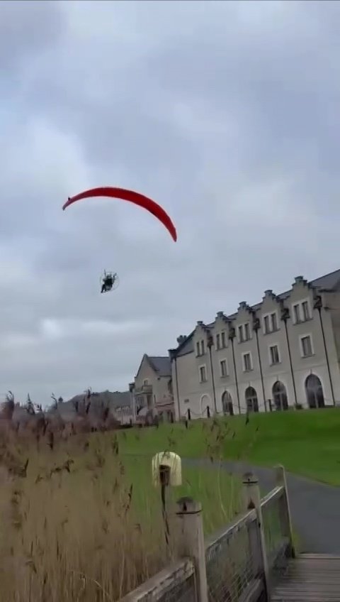 Footage shows the last moments in the air when he was paragliding around the Lough Erne Resort in Co. Fermanagh. Specialist rescue teams from Northern Ireland Fire and Rescue Service & Northern Ireland Ambulance Service. He was Rescue from the roof and transferred to hospital after a lengthy rescue