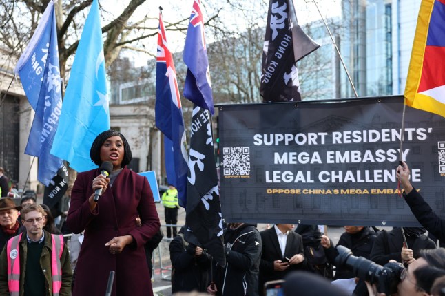 Britain's main opposition Conservative Party leader, Kemi Badenoch speaks to crowds gathering at the site of the former Royal Mint in London on January 17, 2026, to demonstrate against a proposal to move China's embassy to this site, a stones-throw from The Tower of London. Britain's government is set to announce this week whether China can relocate its embassy from its current site in the upmarket Marylebone district, to Royal Mint Court. (Photo by Toby Shepheard / AFP via Getty Images)